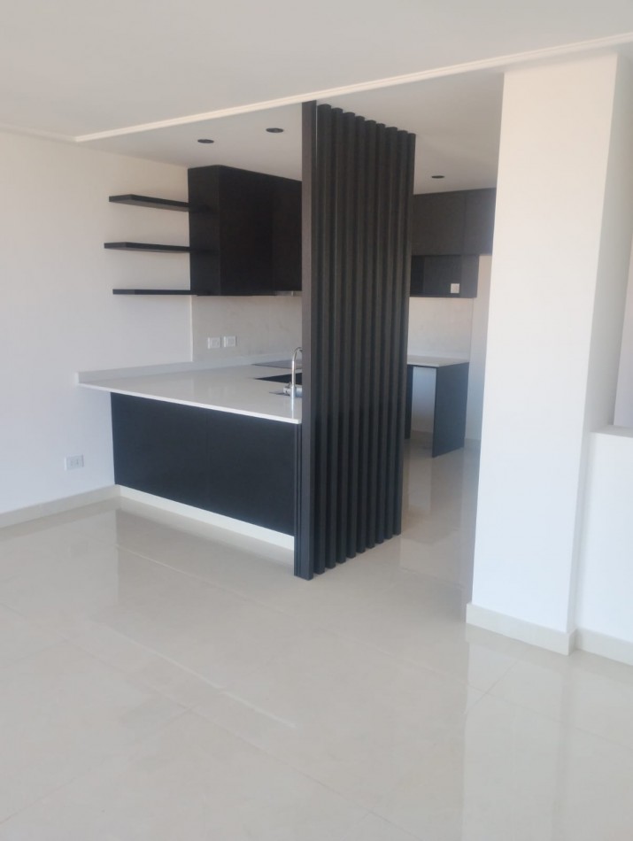 EXCLUSIVO DEPARTAMENTO DE 2 AMBIENTES CON COCHERA. A ESTRENAR. PLAYA GRANDE
