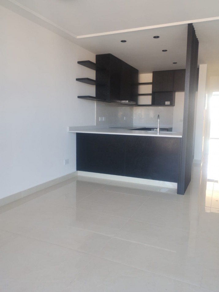 EXCLUSIVO DEPARTAMENTO DE 2 AMBIENTES CON COCHERA. A ESTRENAR. PLAYA GRANDE