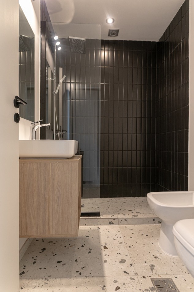 DEPARTAMENTO DE 2 AMBIENTES EN PLANTA BAJA CON JARDIN Y PARRILLA.