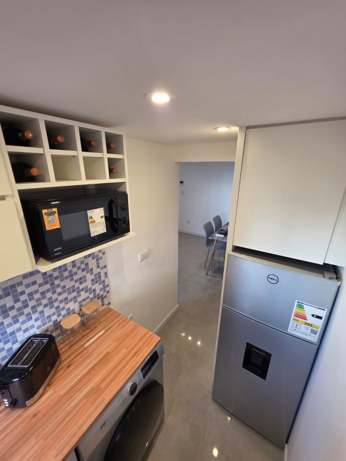 DEPARTAMENTO DE 2 AMBIENTES. RECICLADO Y EQUIPADO. CERCA DE PLAZA COLON